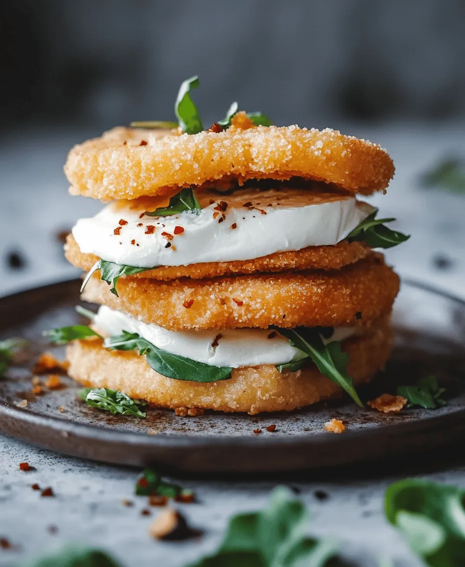 Mozzarella in Carozza ist ein klassisches italienisches Gericht, das die Herzen von Käseliebhabern im Sturm erobert. Diese köstlichen, panierten Sandwiches vereinen den cremigen Geschmack von frischem Mozzarella mit der knusprigen Textur einer goldbraun frittierten Außenschicht. Die Kombination aus dem zartschmelzenden Käse und dem knusprigen Brot ist nicht nur ein Gaumenschmaus, sondern auch eine wahre Explosion an Aromen, die jeden Bissen zu einem unvergesslichen Erlebnis macht.